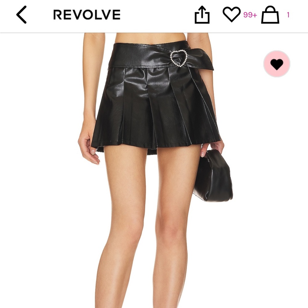 Pleated vegan leather mini skirt in black